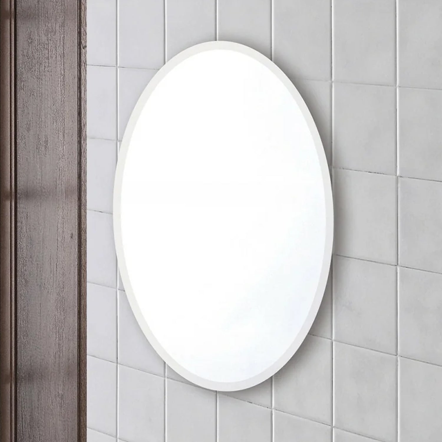 Specchio ovale reversibile con bisellatura a filo Cubi&Co modello Best - 55x85 cm